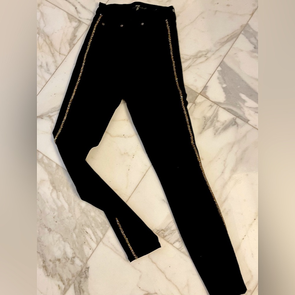7 for all mankind black skinny jeans with gold embellishment on sides. Size 24